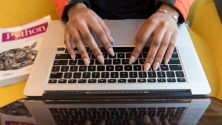 Hands on a keyboard with a Python book  Hands on a keyboard with a Python book