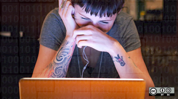 Woman sitting in front of her laptop